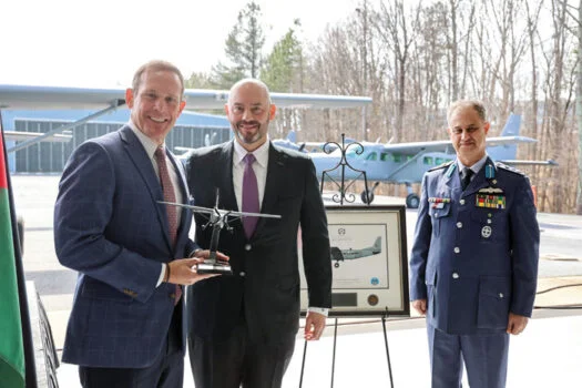 From left: Sen. Ted Budd, IOMAX Chairman and CEO KC Howard and Royal Jordanian Air Force Brigadier General Mohammed Fathi Hiyasat. Photo by Scott Brotherton.