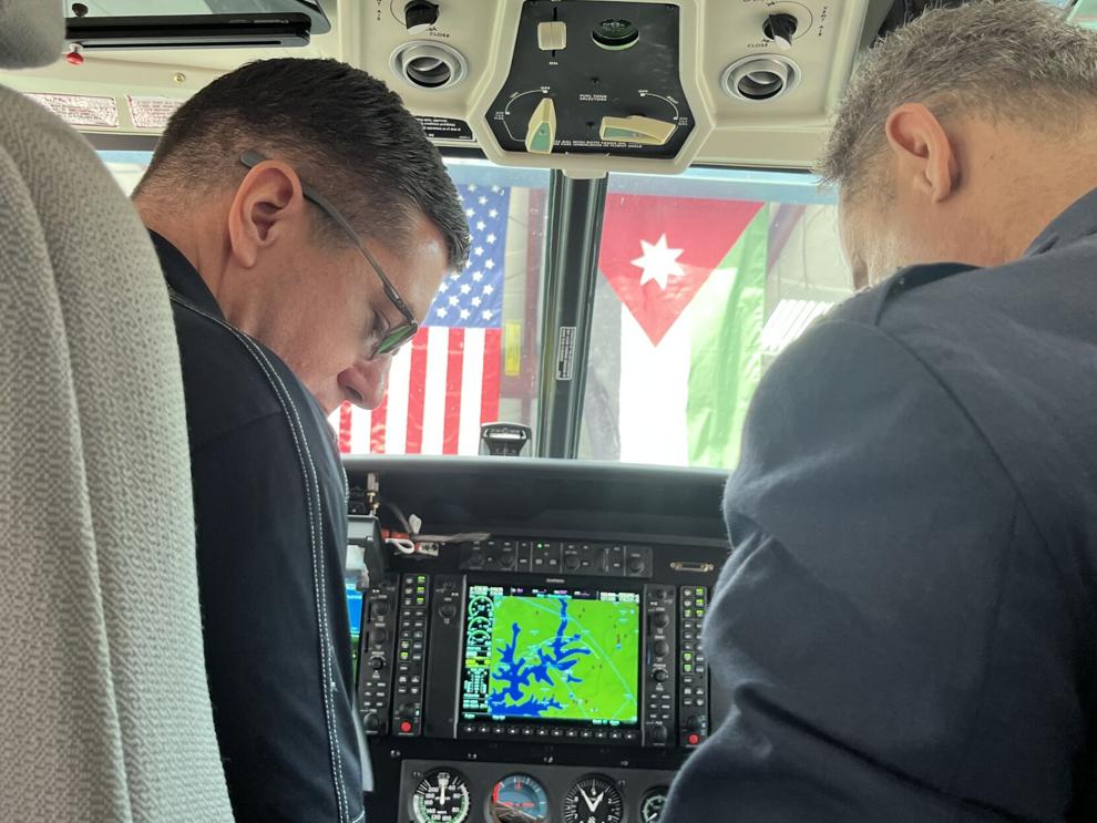 IOMAX's Alan Wilkes shows off the cockpit of a Textron Cessna Caravan