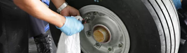 IOMAX picture of aircraft maintenance of wheel 