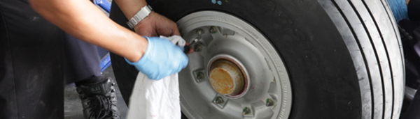 IOMAX picture of aircraft maintenance of wheel 